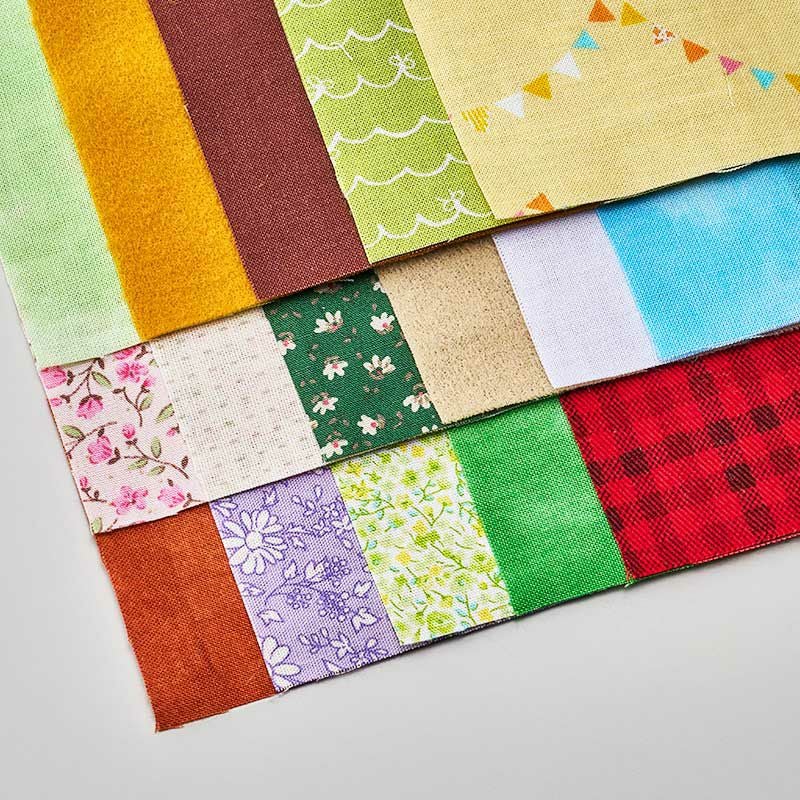 可愛らしい柄布を含む16枚の布を使って仕上げます