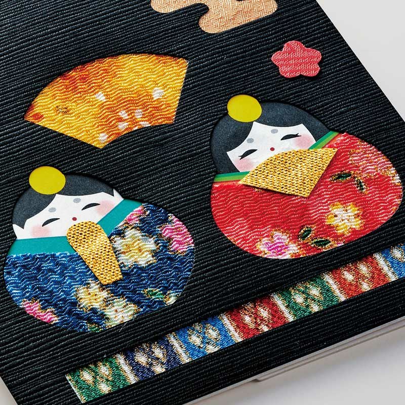 黒地に鮮やかなちりめん布が映えます