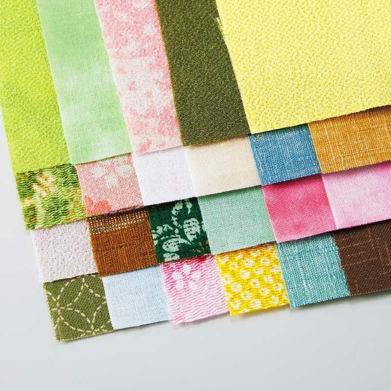 日本の春を表現する優しい色合いの布を23種類使います